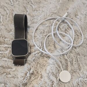 Advanced Smartwatch with Black Strap and Charger